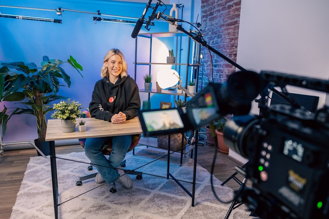 Professional broadcast interview setup with two cameras and professional lighting